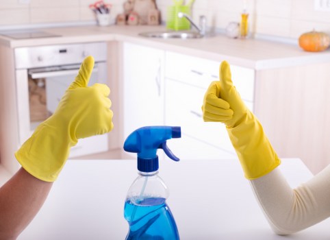 Team member following safe working methods during cleaning